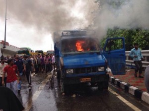 photo 140718 truck fired by the angry crowd